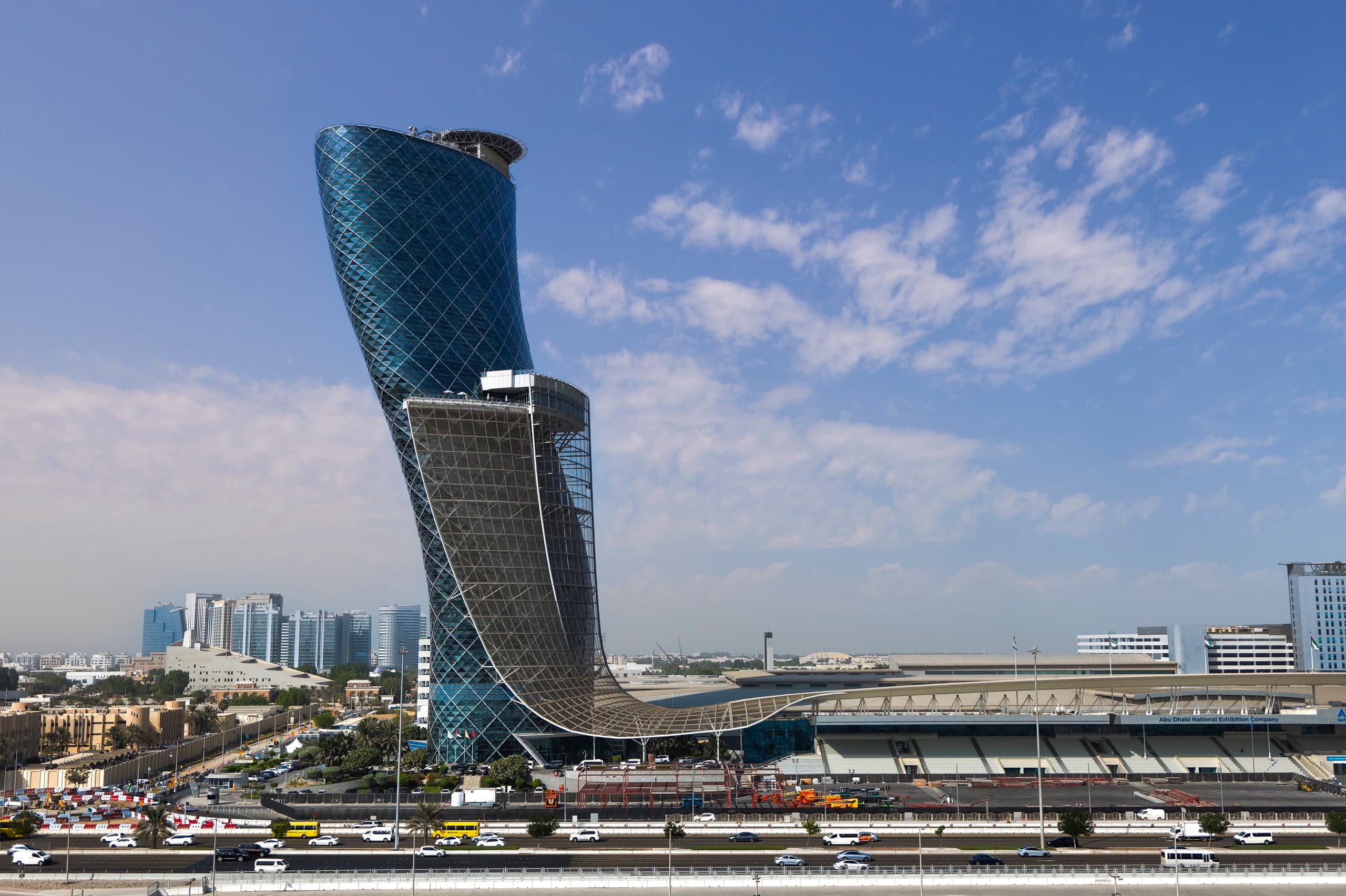 The leaning Capital Gate tower beside the ADNEC exhibition halls