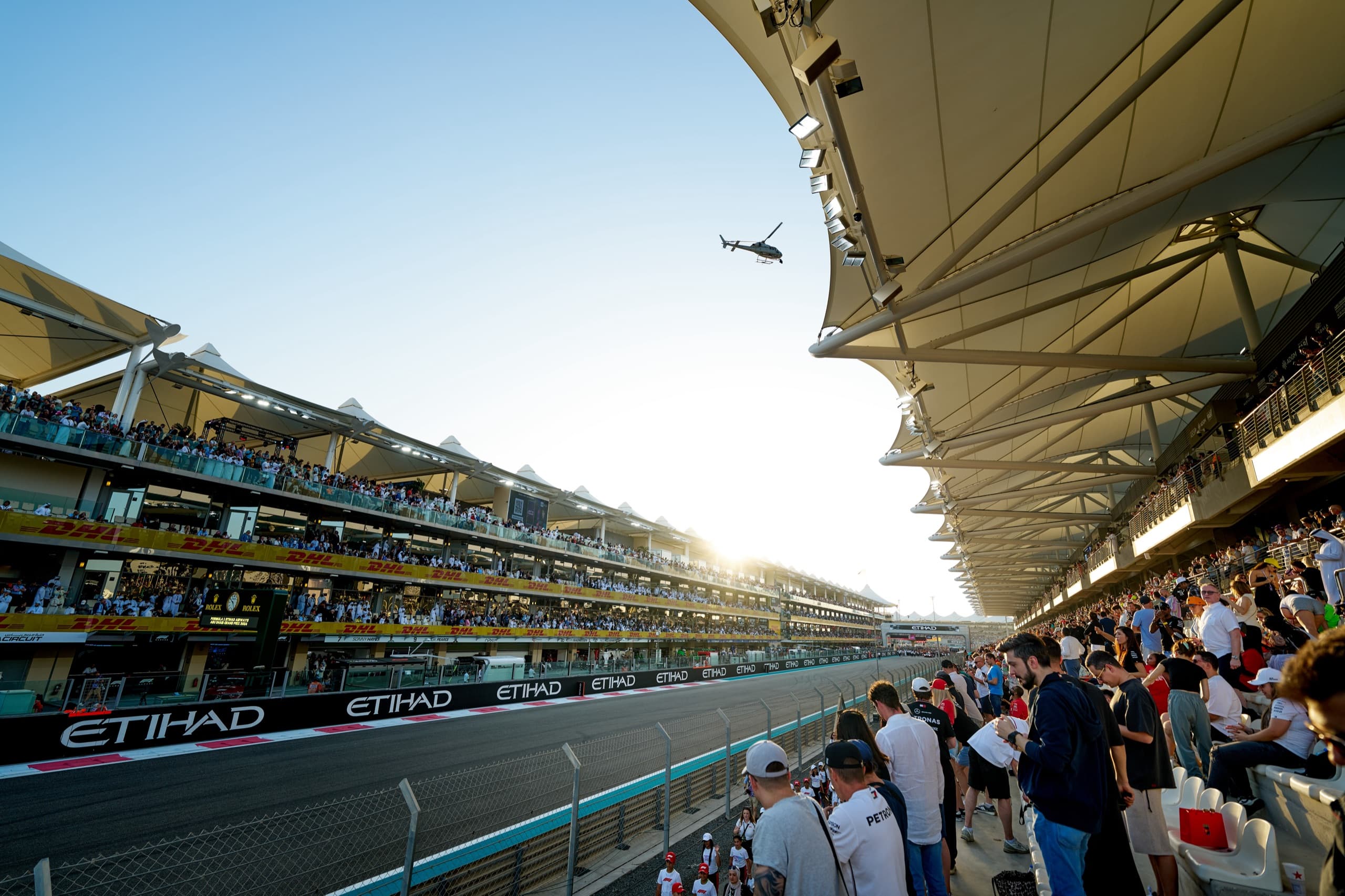 The main straight of Yas Marina Circuit under the grandstand canopy