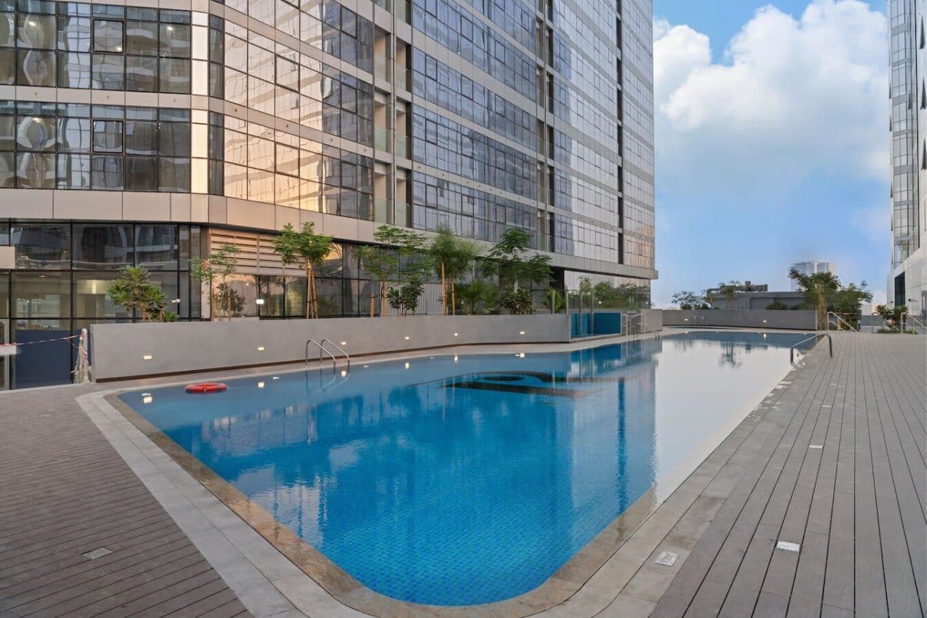 Radiant Square's long podium pool between the towers