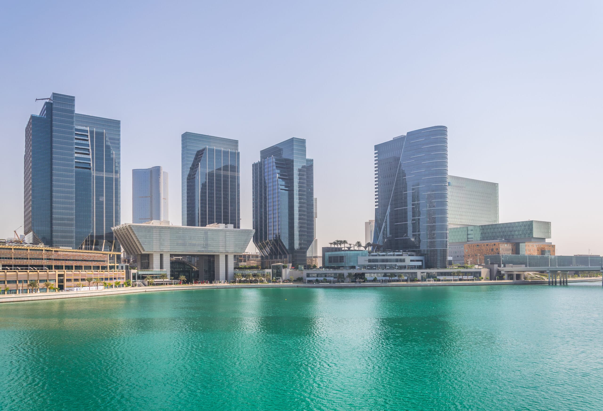 The towers of Al Maryah Island across the turquoise channel